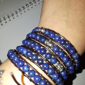 Leather wrap bracelet with lapis beads and sculls